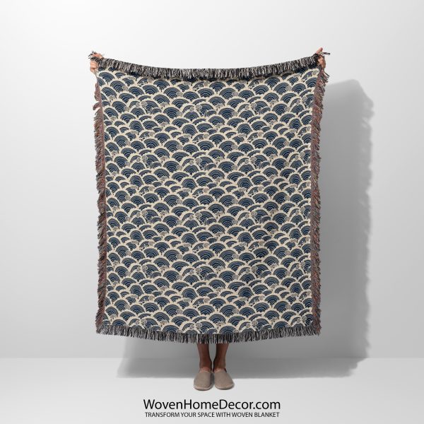 Japanese style woven blanket held by woman, with minimalist design and clean lines.