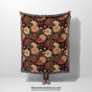 Floral woven blanket held by woman, featuring bold, large flower patterns in bright, contrasting colors.