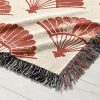 Close-up of Japanese style woven blanket, highlighting detailed pattern and fabric texture.