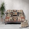 tribal_sunset_woven_blanket_onthesofa