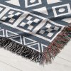 Close-up of the tribal stripe pattern on the Scandinavian Tribal Stripe Woven Blanket.