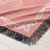 A close-up of the Romantic Girlfriend Woven Blanket’s soft texture and detailed design.