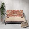 The Vintage Car Bears blanket draped over a sofa, adding a nostalgic feel