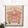 The Vintage Car Bears blanket hung on a wall as a tapestry