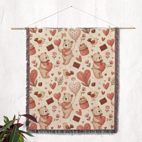 The Whimsical Bear and Balloon Love blanket hung on a wall as a tapestry